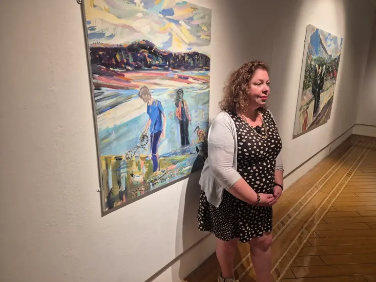 michelle leigh artist with phil in the morning on MIX56